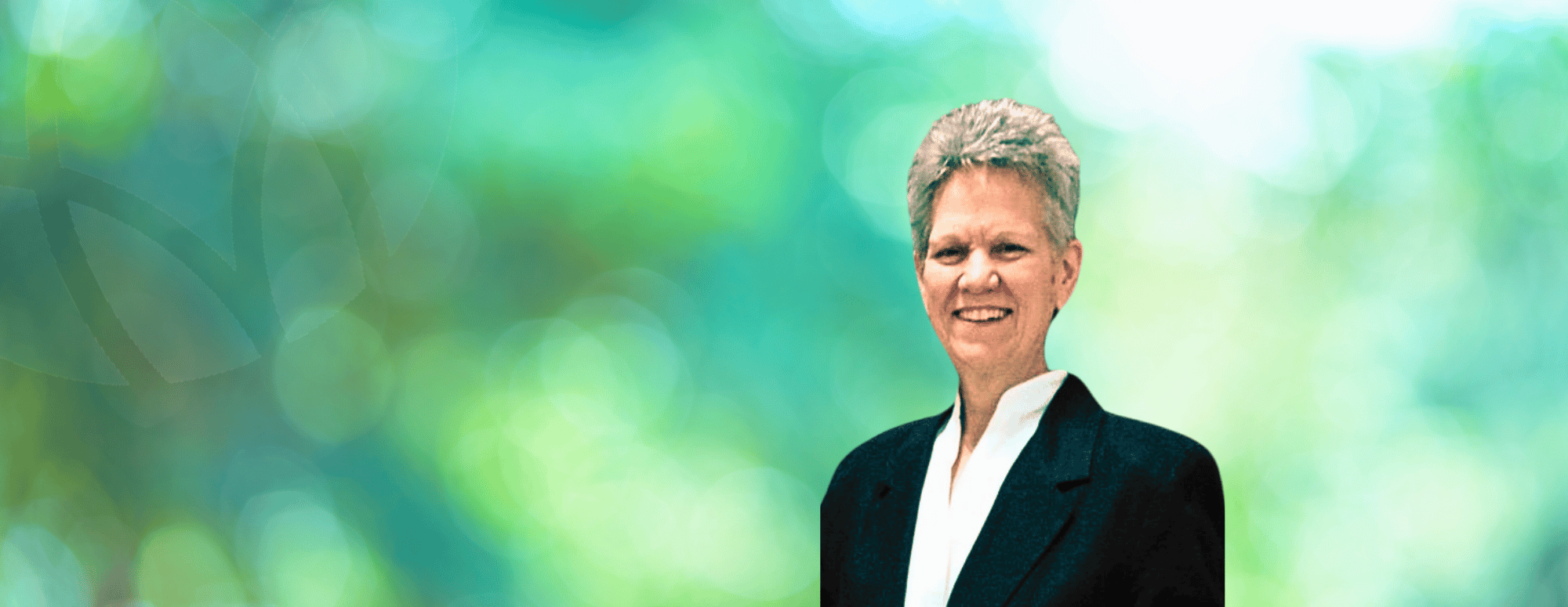 Rev. Jeanie Ward on abstract background