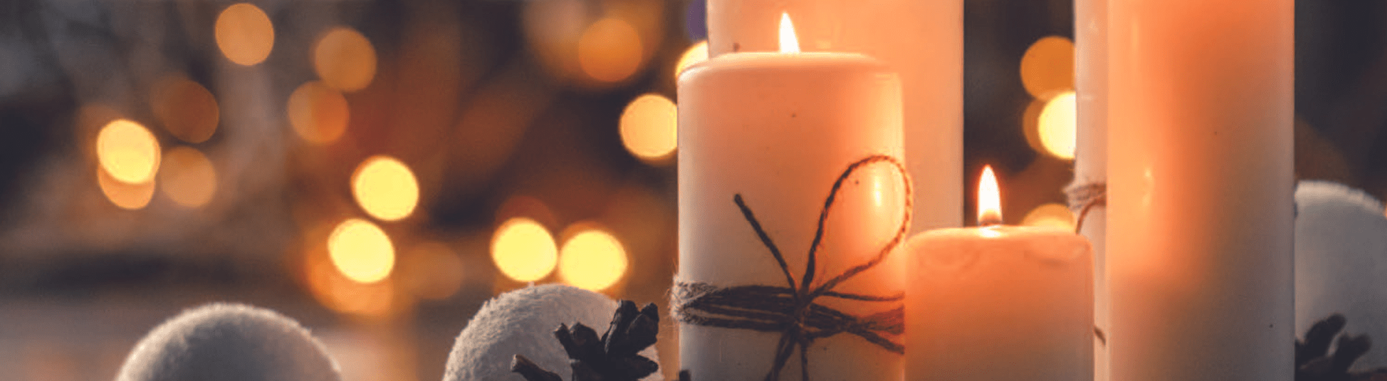 Lighted candles on Bokeh background